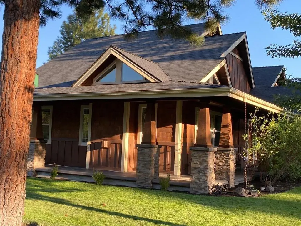 Craftsman-style home with a new shingle roof