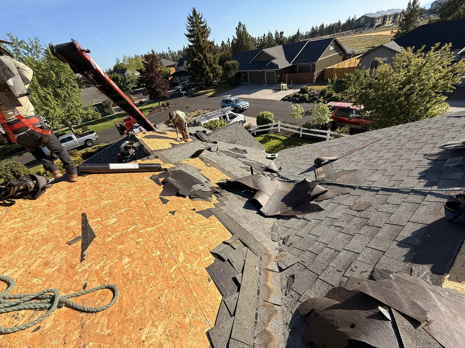 Old shingles torn off down to the wood decking